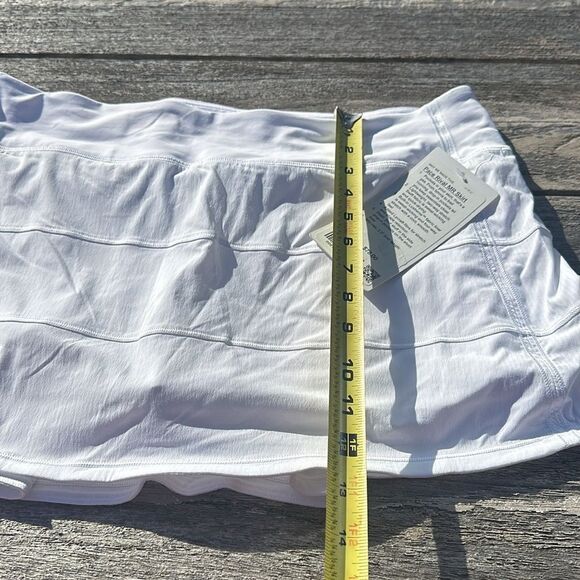Lululemon Pace Rival Skirt Regular 4 way Stretch 13"
White size 12 NWT tennis 🎾 - Picture 8 of 10